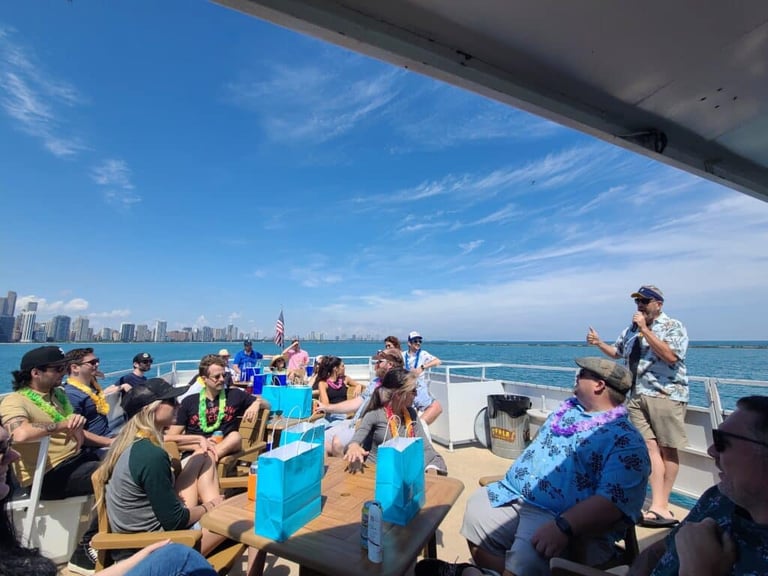 BFO Co-Founder and CEO Steve Krull addresses the team from an Island Party Cruise boat on Lake Michigan 