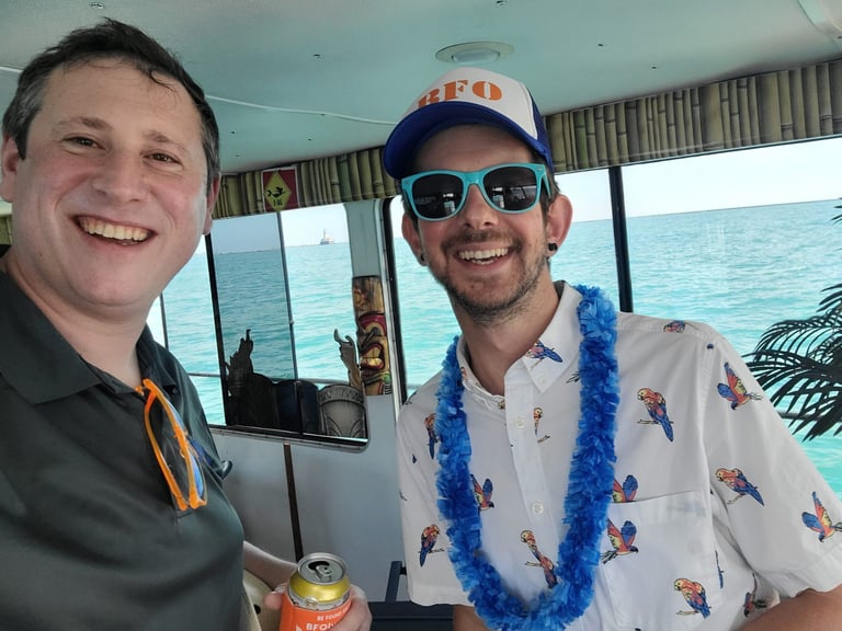 Beefers Dan Golden and Kyle Geib catch some shade on the Island Party Boat on Lake Michigan in Chicago