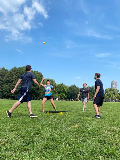 The BFO team plays spikeball in Oz Park, Chicago